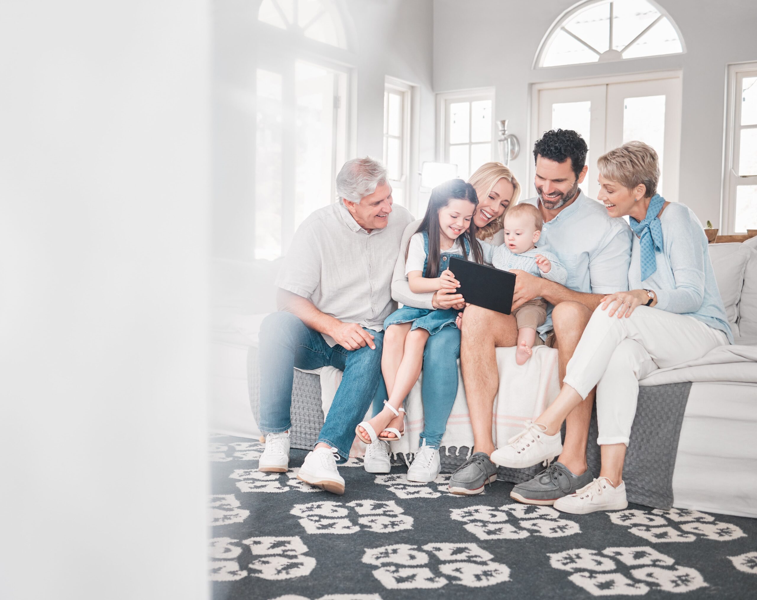 Family discussing visitation rights on a digital tablet